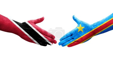 Téléchargez les photos : Poignée de main entre les drapeaux Dr Congo et Trinidad Tobago peints sur les mains, image transparente isolée. - en image libre de droit