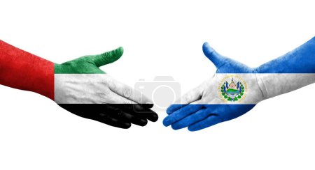 Foto de Saludo entre banderas de El Salvador y Emiratos Árabes Unidos pintadas en las manos, imagen transparente aislada. - Imagen libre de derechos