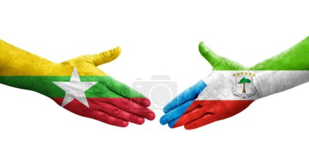 Foto de Apretón de manos entre Guinea Ecuatorial y Myanmar banderas pintadas en las manos, imagen transparente aislada. - Imagen libre de derechos