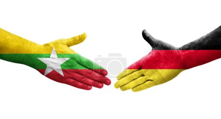 Foto de Apretón de manos entre Alemania y Myanmar banderas pintadas en las manos, imagen transparente aislada. - Imagen libre de derechos