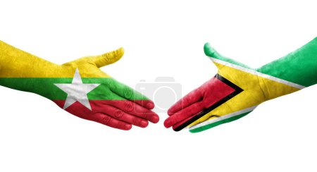 Foto de Apretón de manos entre Guyana y Myanmar banderas pintadas en las manos, imagen transparente aislada. - Imagen libre de derechos