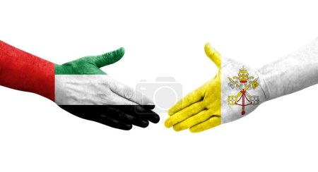 Handshake between Holy See and UAE flags painted on hands, isolated transparent image.