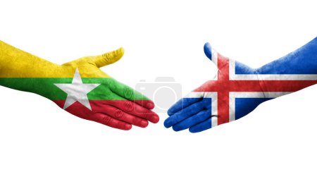 Foto de Apretón de manos entre Islandia y Myanmar banderas pintadas en las manos, imagen transparente aislada. - Imagen libre de derechos