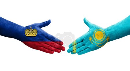 Photo for Handshake between Kazakhstan and Liechtenstein flags painted on hands, isolated transparent image. - Royalty Free Image