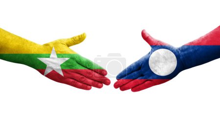 Foto de Apretón de manos entre Laos y Myanmar banderas pintadas en las manos, imagen transparente aislada. - Imagen libre de derechos