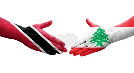Téléchargez les photos : Poignée de main entre le Liban et Trinité Tobago drapeaux peints sur les mains, image transparente isolée. - en image libre de droit