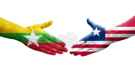 Foto de Apretón de manos entre Liberia y Myanmar banderas pintadas en las manos, imagen transparente aislada. - Imagen libre de derechos