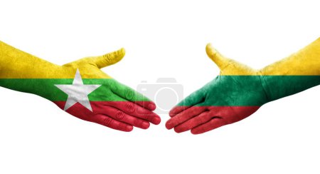 Poignée de main entre la Lituanie et le Myanmar drapeaux peints sur les mains, image transparente isolée.