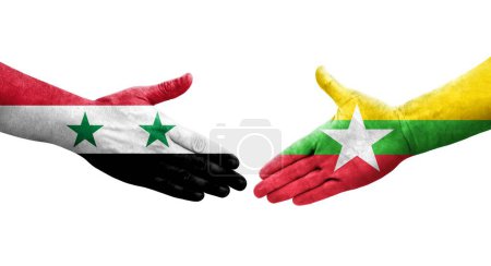 Foto de Apretón de manos entre Myanmar y Siria banderas pintadas en las manos, imagen transparente aislada. - Imagen libre de derechos