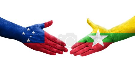 Foto de Apretón de manos entre Myanmar y Samoa banderas pintadas en las manos, imagen transparente aislada. - Imagen libre de derechos
