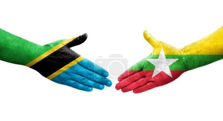 Foto de Apretón de manos entre Myanmar y Tanzania banderas pintadas en las manos, imagen transparente aislada. - Imagen libre de derechos