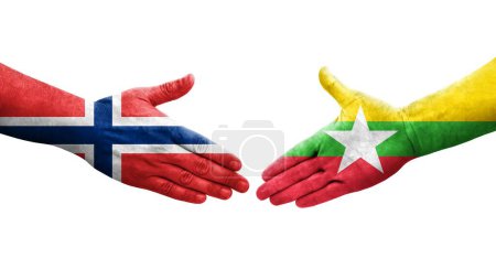 Foto de Apretón de manos entre Myanmar y Noruega banderas pintadas en las manos, imagen transparente aislada. - Imagen libre de derechos