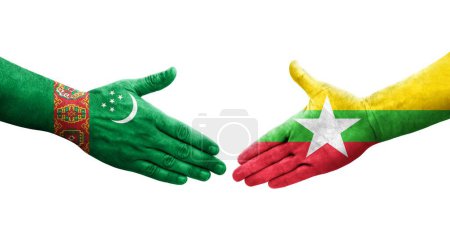 Foto de Apretón de manos entre Myanmar y Turkmenistán banderas pintadas en las manos, imagen transparente aislada. - Imagen libre de derechos