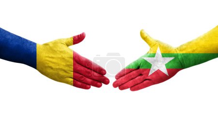 Foto de Apretón de manos entre Myanmar y Rumania banderas pintadas en las manos, imagen transparente aislada. - Imagen libre de derechos