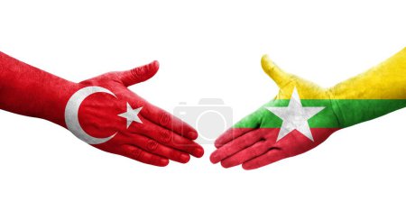 Foto de Apretón de manos entre Myanmar y Turquía banderas pintadas en las manos, imagen transparente aislada. - Imagen libre de derechos