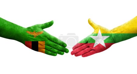 Foto de Apretón de manos entre Myanmar y Zambia banderas pintadas en las manos, imagen transparente aislada. - Imagen libre de derechos