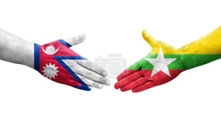 Foto de Apretón de manos entre Myanmar y Nepal banderas pintadas en las manos, imagen transparente aislada. - Imagen libre de derechos