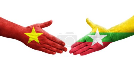 Foto de Apretón de manos entre Myanmar y Vietnam banderas pintadas en las manos, imagen transparente aislada. - Imagen libre de derechos