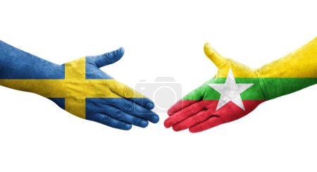 Foto de Apretón de manos entre Myanmar y Suecia banderas pintadas en las manos, imagen transparente aislada. - Imagen libre de derechos