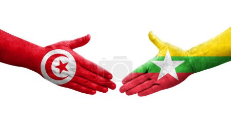 Foto de Apretón de manos entre Myanmar y Túnez banderas pintadas en las manos, imagen transparente aislada. - Imagen libre de derechos