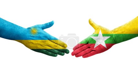 Foto de Apretón de manos entre Myanmar y Ruanda banderas pintadas en las manos, imagen transparente aislada. - Imagen libre de derechos