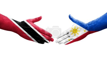 Téléchargez les photos : Poignée de main entre Philippines et Trinité Tobago drapeaux peints sur les mains, image transparente isolée. - en image libre de droit