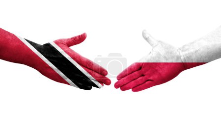 Téléchargez les photos : Poignée de main entre la Pologne et Trinité Tobago drapeaux peints sur les mains, image transparente isolée. - en image libre de droit