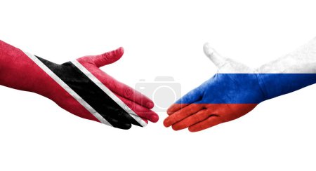 Téléchargez les photos : Poignée de main entre la Russie et Trinité Tobago drapeaux peints sur les mains, image transparente isolée. - en image libre de droit