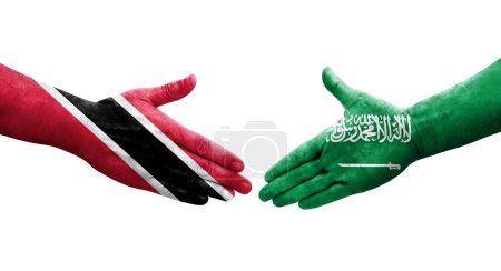 Téléchargez les photos : Poignée de main entre l'Arabie Saoudite et Trinité Tobago drapeaux peints sur les mains, image transparente isolée. - en image libre de droit