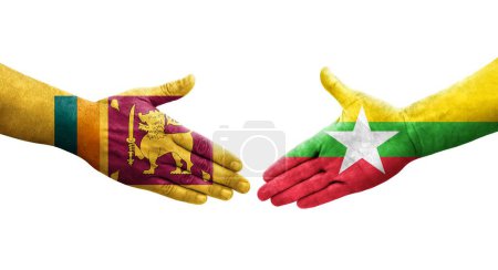 Foto de Apretón de manos entre Sri Lanka y Myanmar banderas pintadas en las manos, imagen transparente aislada. - Imagen libre de derechos