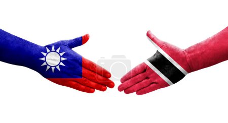 Téléchargez les photos : Poignée de main entre Taiwan et Trinité Tobago drapeaux peints sur les mains, image transparente isolée. - en image libre de droit