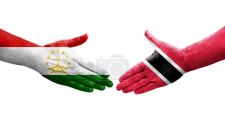 Téléchargez les photos : Poignée de main entre le Tadjikistan et Trinité Tobago drapeaux peints sur les mains, image transparente isolée. - en image libre de droit