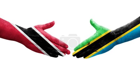 Téléchargez les photos : Poignée de main entre la Tanzanie et Trinité Tobago drapeaux peints sur les mains, image transparente isolée. - en image libre de droit