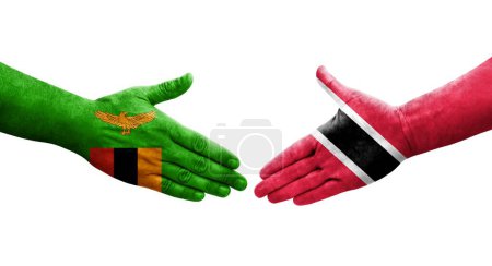 Téléchargez les photos : Poignée de main entre Trinité Tobago et Zambie drapeaux peints sur les mains, image transparente isolée. - en image libre de droit