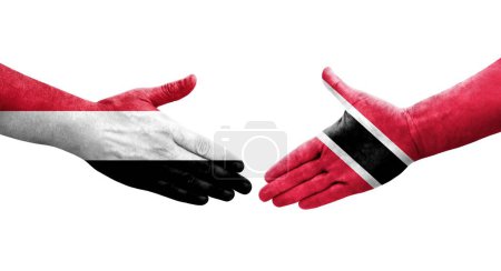 Téléchargez les photos : Poignée de main entre Trinité Tobago et le Yémen drapeaux peints sur les mains, image transparente isolée. - en image libre de droit