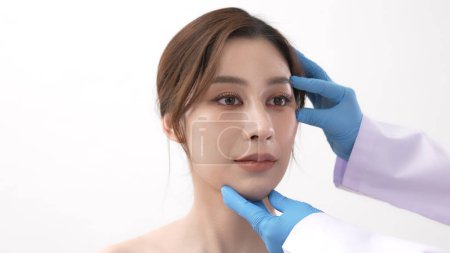 Photo for Beauty concept of 4k Resolution. Asian woman preparing for facial surgery on white background. - Royalty Free Image