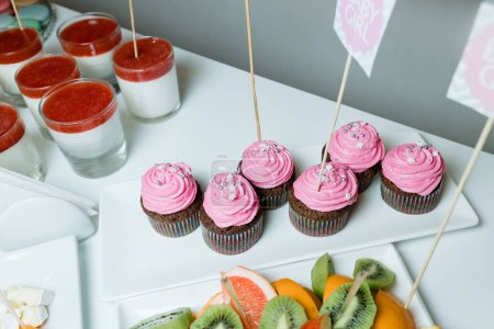Photo for Baby shower and sweets on the table. Flash light. High quality photo - Royalty Free Image