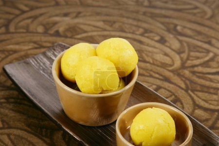 Photo for Rajbhog or Yellow Bengali Rasgulla or Cham Cham - Indian Sweet - Royalty Free Image