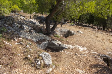 Photo for Mycenaean cemetery near the road leading to the town of Kambi, place of interest for tourists - Royalty Free Image