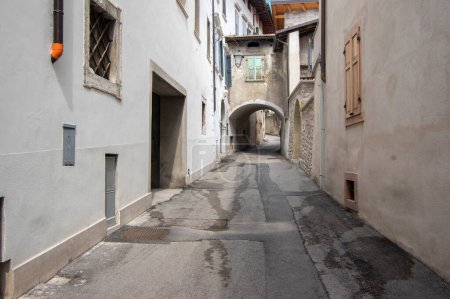 Photo for Varignano, Arco, Italy - June 3, 2022: Amazing narrow streets whit old mountain houses, way of living in italian Alps - Royalty Free Image
