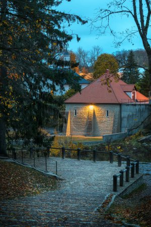 Photo for View of the beautiful medieval hydroelectric power station in Keila - Joa Park in the evening. Autumn evening photography of the sights of Estonia. - Royalty Free Image