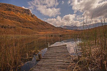 Trout dam with cloud reflections in the Cathkin Peak area of the Drakensberg Mountains South Africa