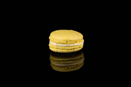 Photo for Colorful macaroons over a black background with reflection - Royalty Free Image