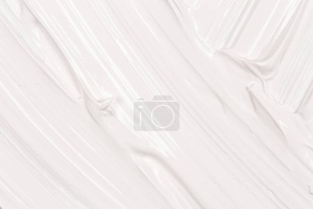 Foto de Hand made oil paint brush stroke splash over the white paper as a design element of a backdrop - Imagen libre de derechos