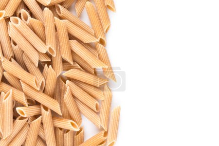 Photo for Wholemeal Pasta Penne as close-up shot isolated on white background - Royalty Free Image