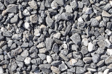 Foto de Piedra gris triturada en el fondo de textura del suelo - Imagen libre de derechos