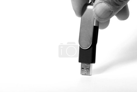 Photo for USB flash memory in hand on white background - Royalty Free Image