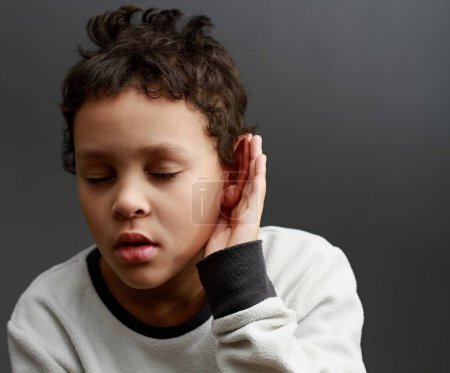 deafness suffering from loss hearing on grey background 