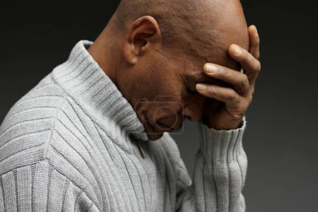 Photo for Praying to god for forgiveness Caribbean man praying  with people stock image stock photo - Royalty Free Image