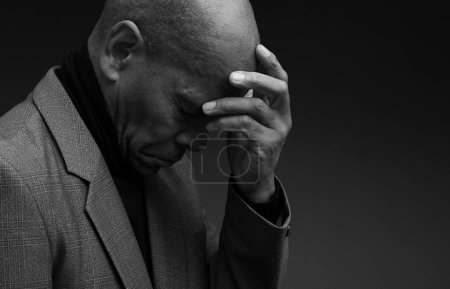 Photo for Caribbean man praying to god for forgiveness - Royalty Free Image